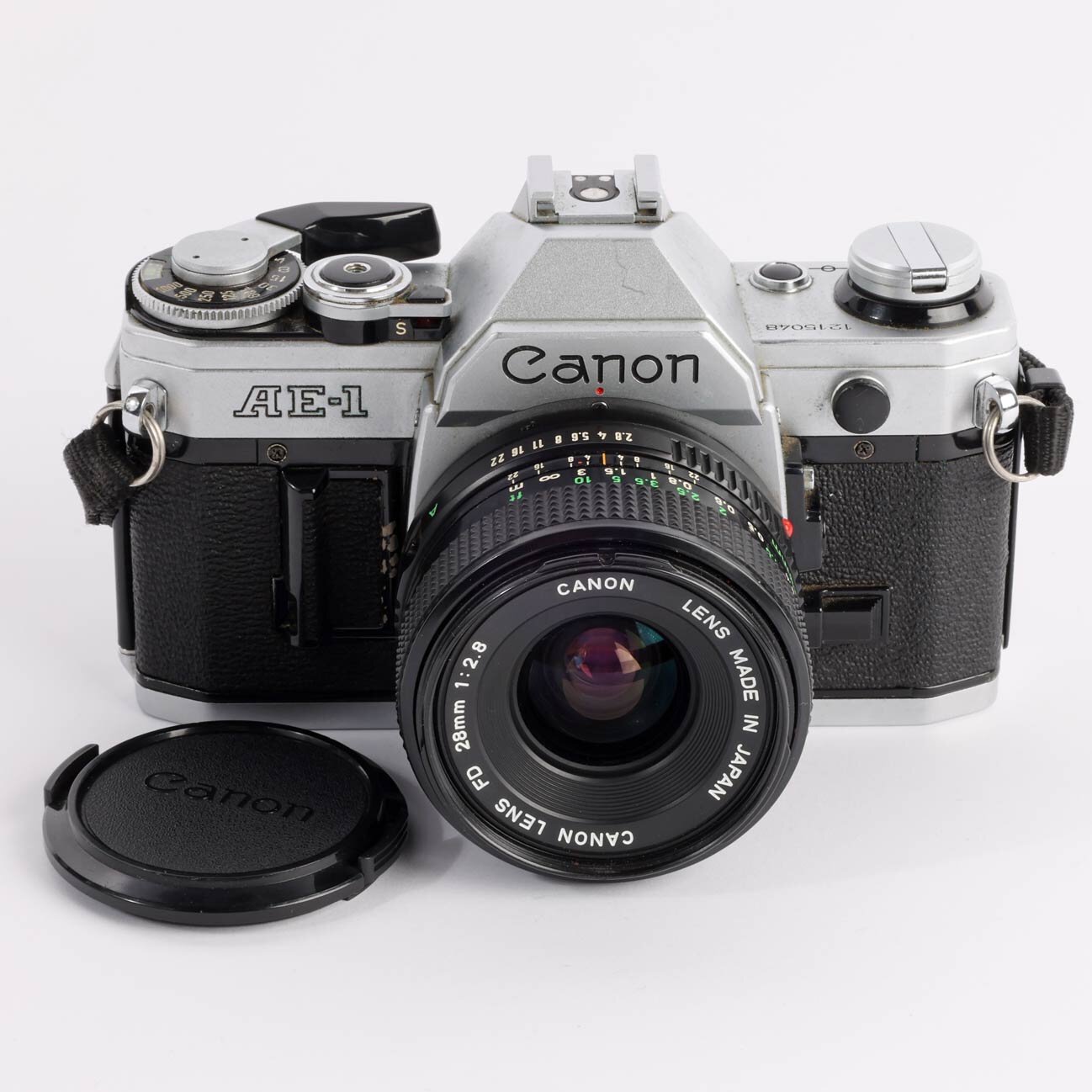 Canon AE-1 Canon 2,8/28 FD chrom ▻ bei SHphoto.de